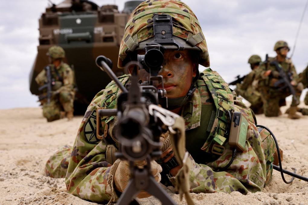 Japanese Ground Self-Defense Force’s Amphibious Rapid Deployment Brigade (ARDB) soldiers take part in a marine landing drill as a part of the country’s nationwide 05JX military exercises at Tokunoshima island. Photo: Reuters