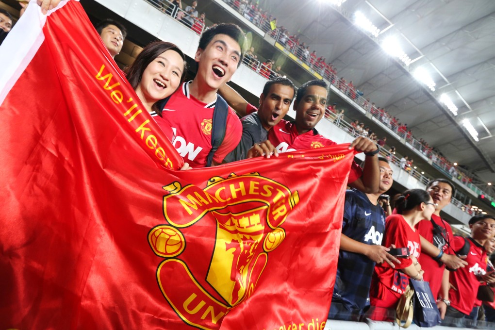 Fans of Manchester United during the 2013 pre-season match against Kitchee at Hong Kong Stadium. Photo: Felix Wong