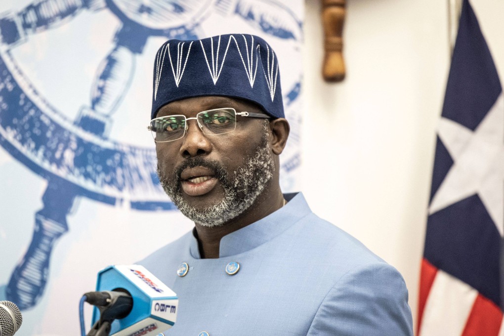 Liberian President George Weah talks to the press at the inauguration of the new Liberian International Ship and Corporate Registry building in Monrovia in November 2021. Photo: AFP