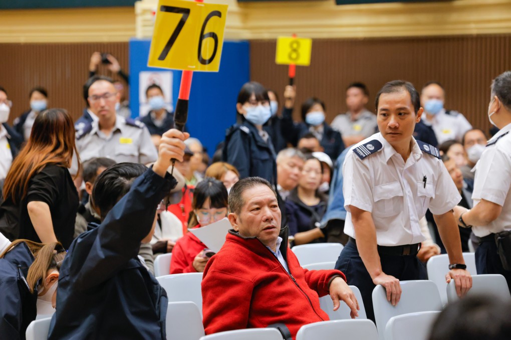 Attendees place bids for 2024 Lunar New Year fair stalls at the Lai Chi Kok Government Offices in Lai Chi Kok on Monday. Photo: Jelly Tse