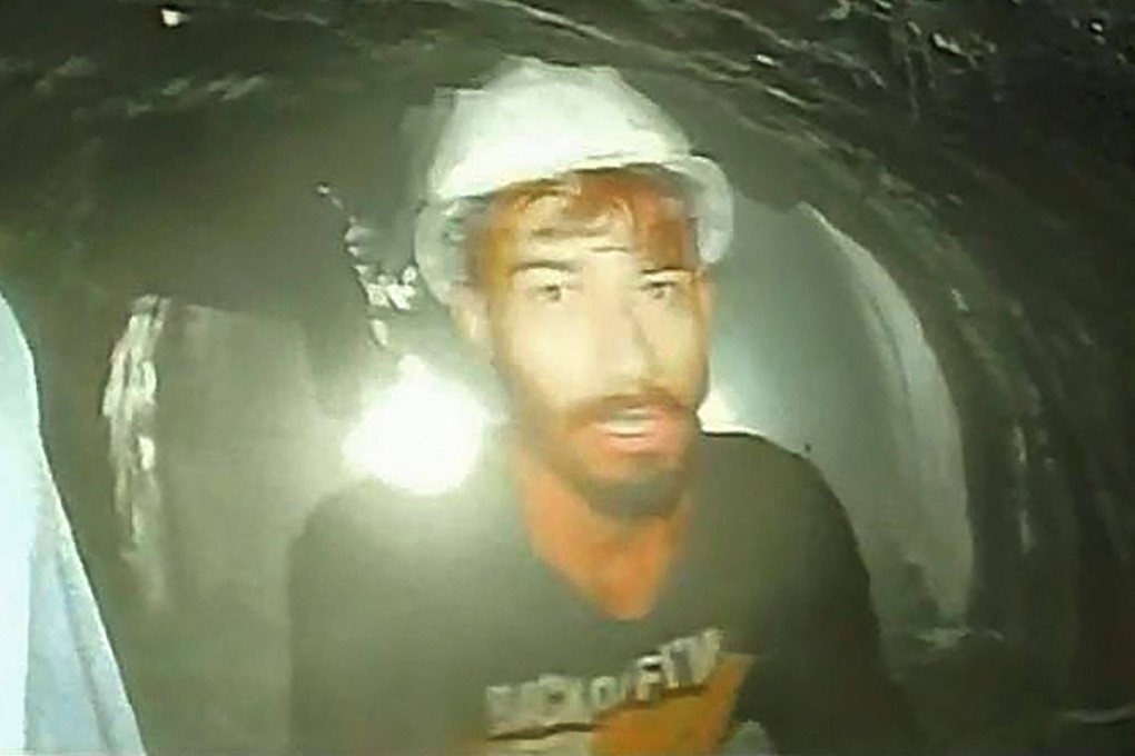 A worker trapped inside the partially collapsed tunnel in India’s Uttarakhand state is seen in this picture taken with an endoscopic camera and released by Uttarakhand’s Department of Information and Public Relations on Tuesday. Photo: DIPR Uttarakhand / AFP