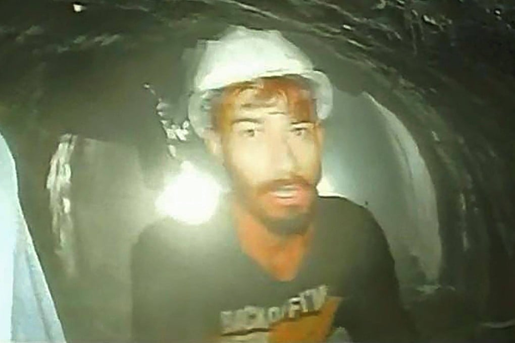 A worker trapped inside the partially collapsed tunnel in India’s Uttarakhand state is seen in this picture taken with an endoscopic camera and released by Uttarakhand’s Department of Information and Public Relations on Tuesday. Photo: DIPR Uttarakhand / AFP