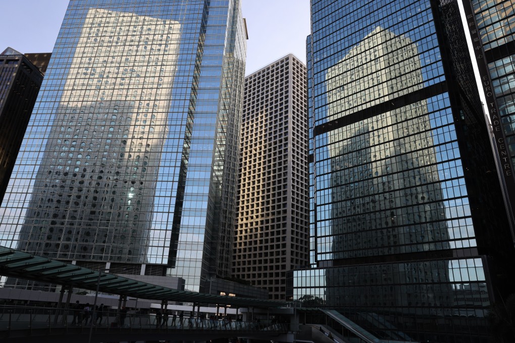 Jardine House is reflected on Chater House and Worldwide House in Hong Kong’s Central district. Photo: May Tse