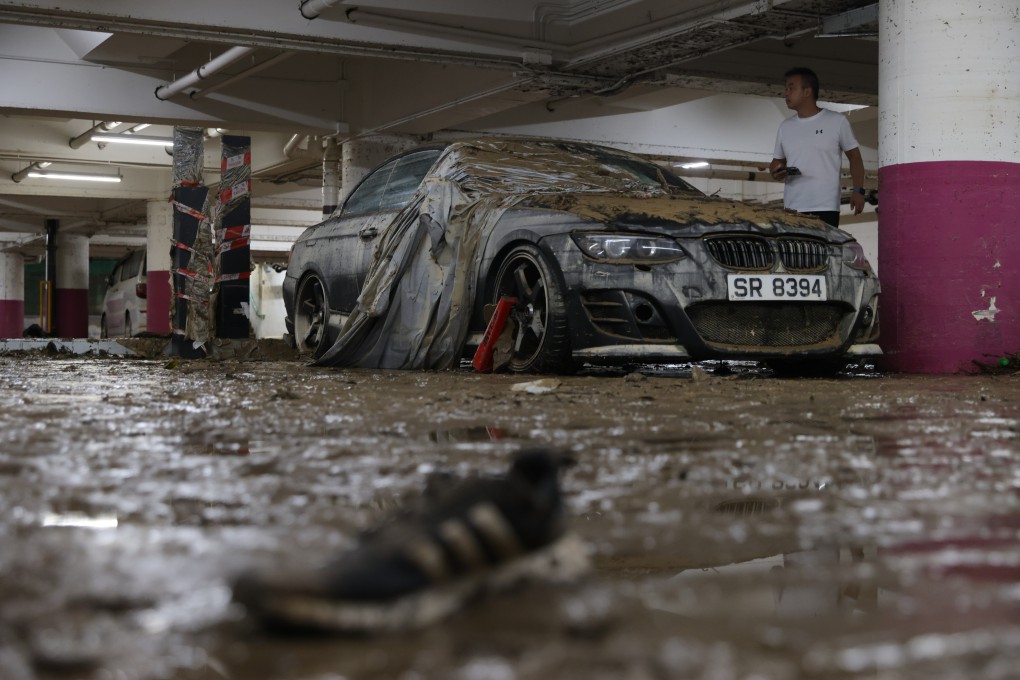 A man surveys the aftermath of flooding in Wan Tsui Estate car park in Chai Wan on September 9, 2023 after torrential rain in Hong Kong. Photo: Yik Yeung-man