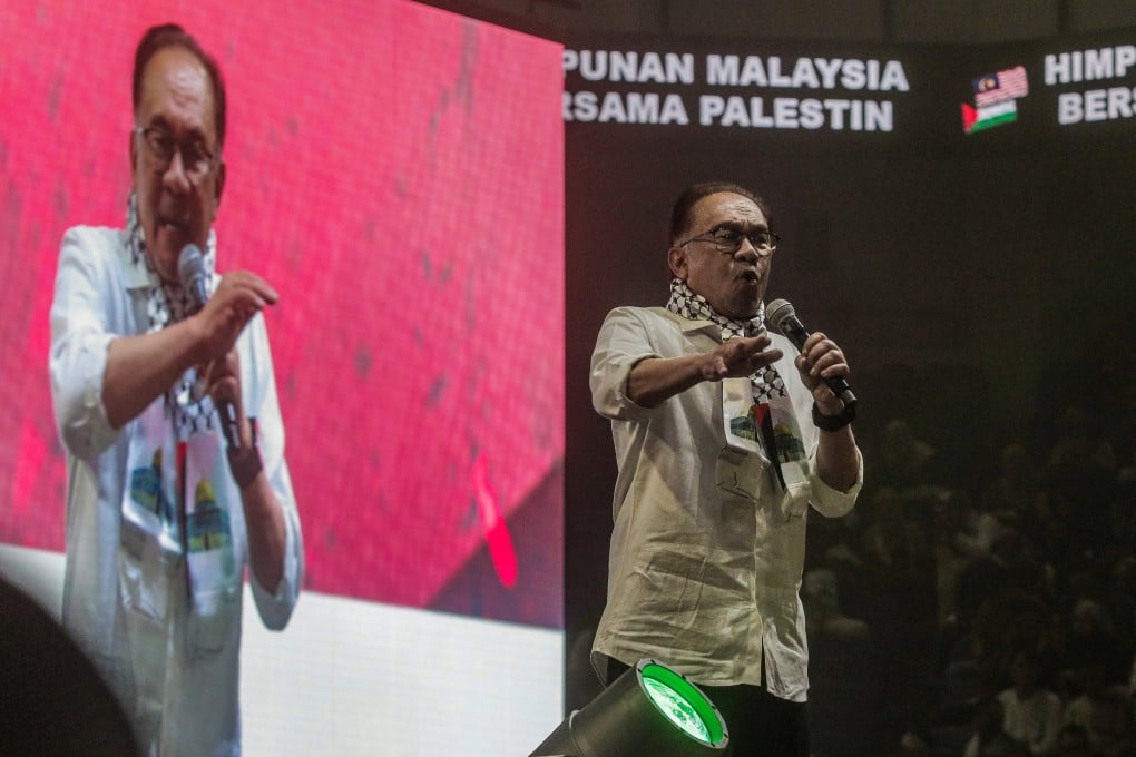 Malaysia’s Prime Minister Anwar Ibrahim speaks at the ‘Malaysia Stands with Palestine’ rally in Kuala Lumpur on October 24. Photo: EPA-EFE