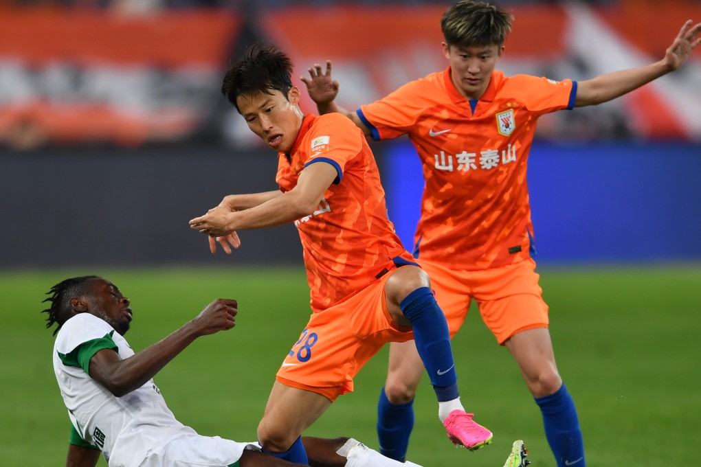 Son Jun-ho (centre) has played for Chinese Super League side Shandong Taishan since 2021. Photo: Xinhua