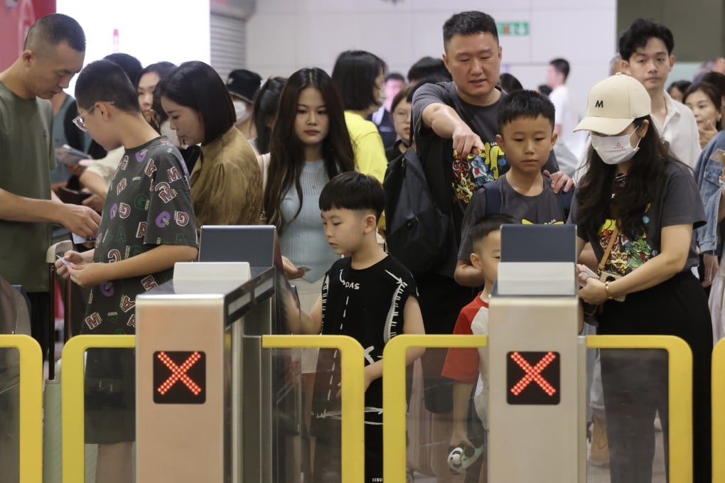 Travellers pass through gates at Hong Kong’s West Kowloon station. The high-speed rail link currently connects the city to 73 mainland destinations. Photo: Jonathan Wong