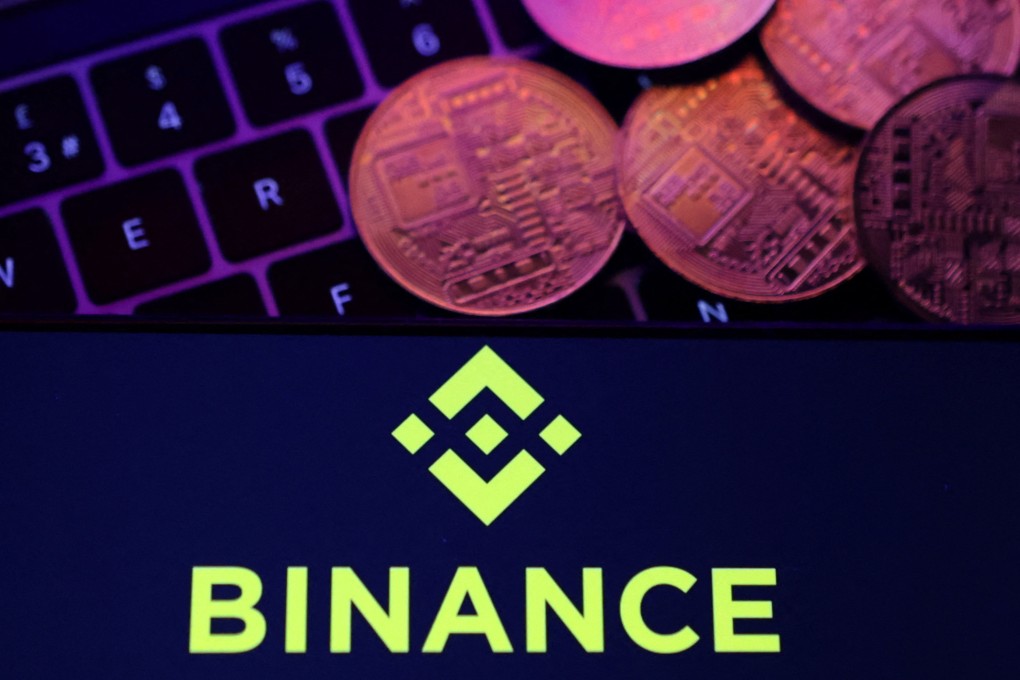 The Binance logo and a representation of cryptocurrencies are placed on a keyboard in this illustration, November 8, 2022. Photo: Reuters