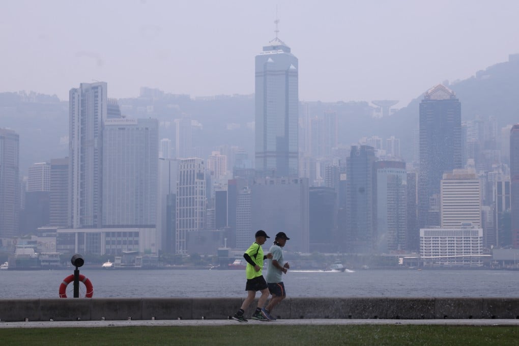 Joggers at the West Kowloon Art Park in July. Hong Kong aims to be carbon neutral by 2050. Photo: May Tse