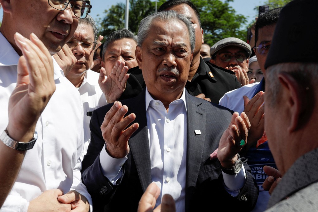 Muhyiddin Yassin, a former prime minister, arrives to give a statement to the Malaysian Anti-Corruption Commission (MACC) in March. Photo: Reuters