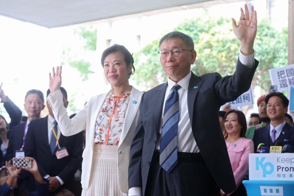 Taiwan People’s Party presidential candidate Ko Wen-je (right) and his running mate Wu Hsin-ying arrive to register their candidacy at the Central Election Commission office in Taipei on Friday. Photo: Bloomberg