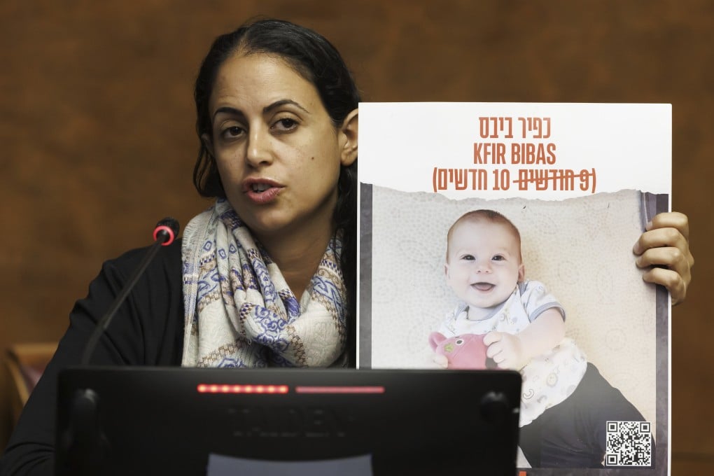 Ofri Bibas Levy, sister of Yarden Bibas, held hostage in Gaza with his wife, Shiri and two kids, Kfir and Ariel, talks to the media in Geneva, Switzerland on November 14. Photo: Keystone via AP