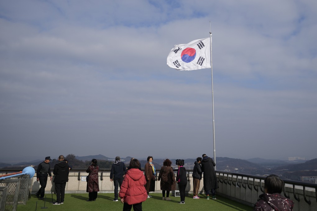 A South Korean national flag flutters in the wind at the unification observatory in Paju, South Korea on Wednesday. Photo: AP