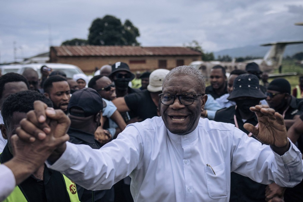 Congolese presidential candidate Denis Mukwege greets supporters outside Kavumu-Bukavu airport on Saturday. Photo: AFP