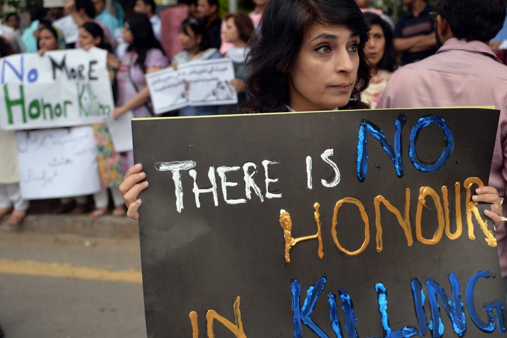 Pakistani human rights activists at a 2014 rally against honour killing. Around 1,000 women in Pakistan are killed yearly by relatives on the pretext of preserving the family’s honour. Photo: AFP