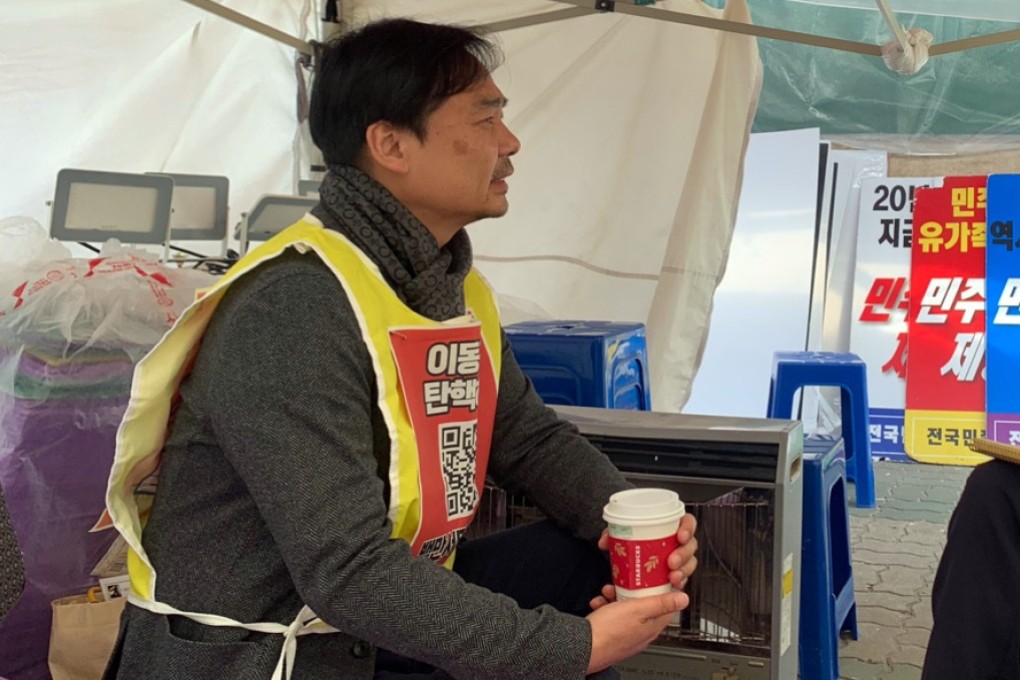 Yoon Chang-hyeon (left), head of the National Union of Media Workers, is interviewed by Park Chan-kyong in Seoul in November 2023. Photo: Handout