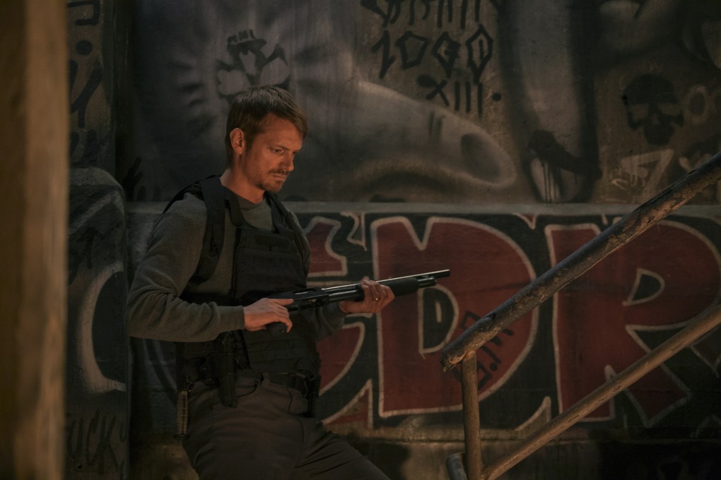 Joel Kinnaman plays an avenging father in a still from “Silent Night”, directed by John Woo. Scott Mescudi and Harold Torres co-star. Photo: Carlos Latapi/Lionsgate