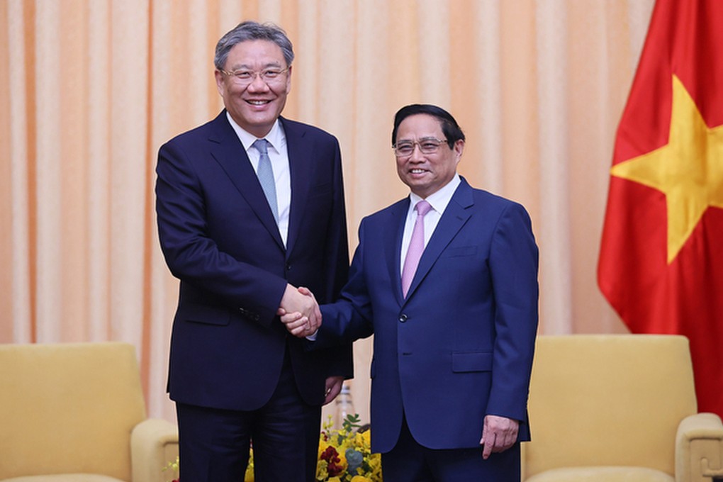Chinese Minister of Commerce Wang Wentao (left) met Vietnamese Prime Minister Pham Minh Chinh on Saturday in Ho Chi Minh City. Photo: Ministry of Commerce
