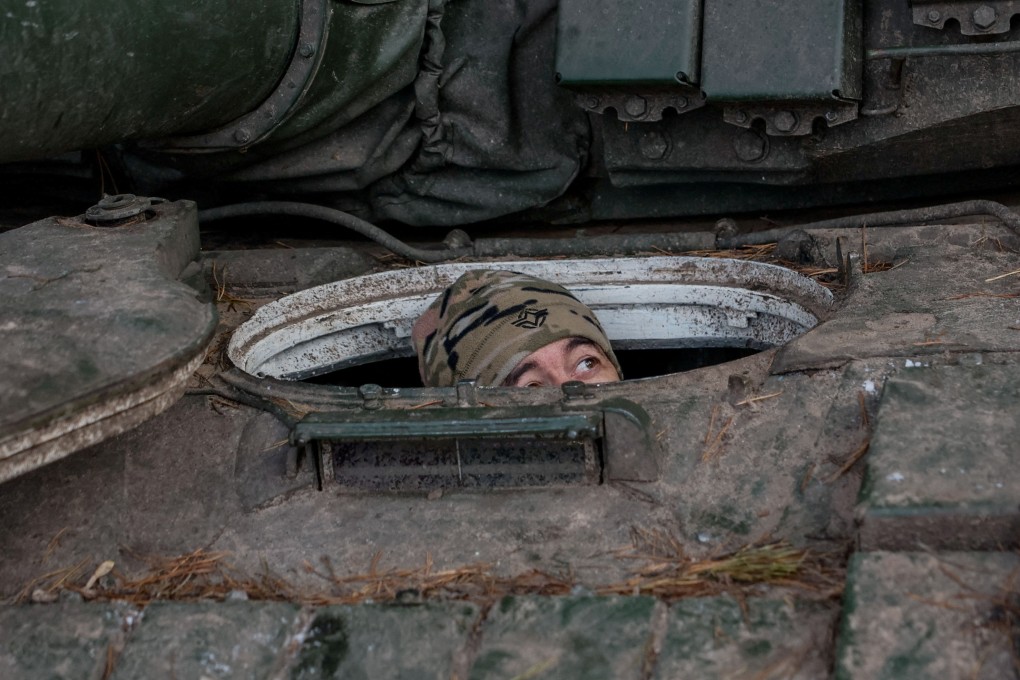 A Ukrainian serviceman in a T-72 main battle tank. Photo: Reuters