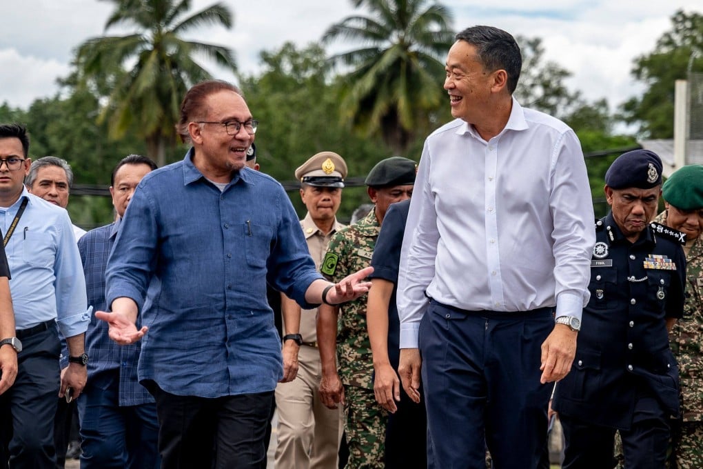 Malaysian Prime Minister Anwar Ibrahim (left) walks with his Thai counterpart Srettha Thavisin during their meeting on Monday in Thailand’s Sadao near the Malaysia-Thailand border. Photo: Prime Minister’s Office of Malaysia/AFP