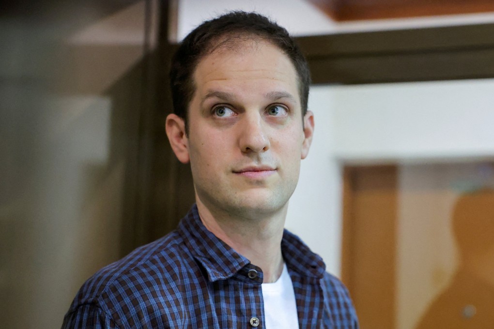 Wall Street Journal reporter Evan Gershkovich stands inside an enclosure for defendants before a court hearing to consider an appeal against his pre-trial detention on espionage charges in Moscow, Russia. Photo: Reuters