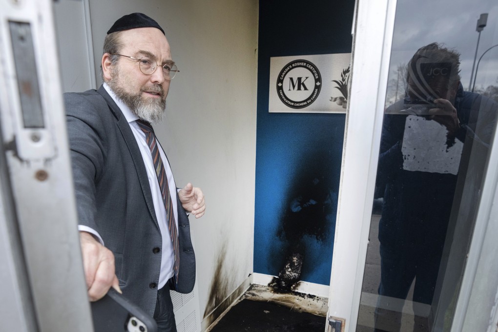 Scorch marks are shown at the entrance of the Jewish community centre. Photo: Canadian Press via AP
