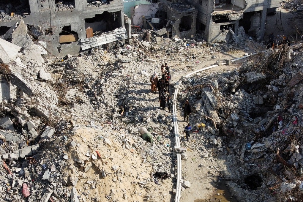 Residential buildings destroyed in Israeli strikes at Khan Younis refugee camp in southern Gaza on Monday. Photo: Reuters
