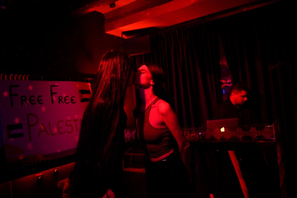 A drag performer kisses a girl during a drag show at Muslim-majority Kosovo’s first LGBTQ bar, Bubble. The venue’s mere existence - it opened earlier in 2023 - represents a big shift towards tolerance in a once oppressive society. Photo: AFP