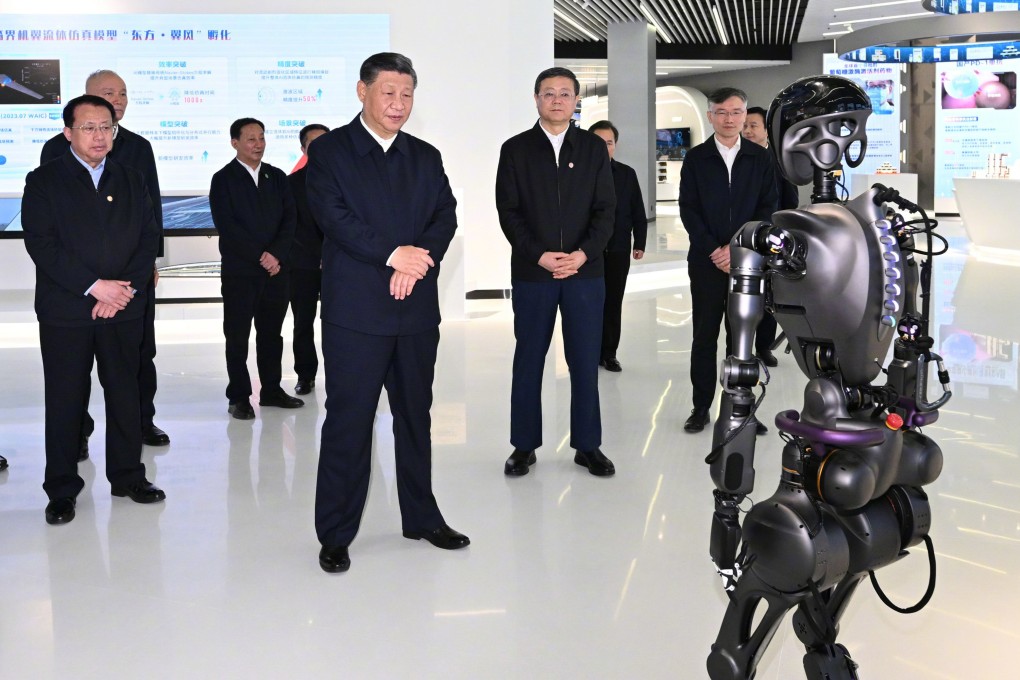 Xi Jinping watches a human-like robot go through its paces at the Shanghai Science and Technology Innovation Exhibition. Photo: Xinhua