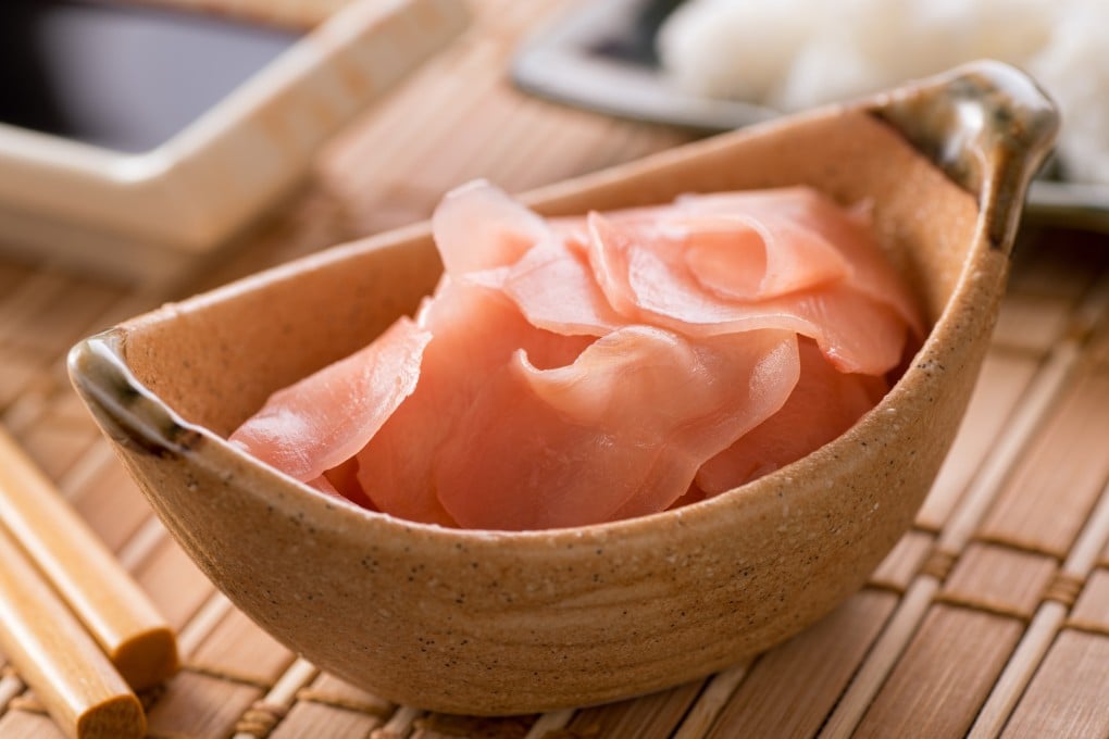 Pickled ginger slices are typically served to accompany sushi. Raw ginger benefits health in a variety of ways, and some, but not all, of these are preserved when the root is pickled. Shutterstock Images