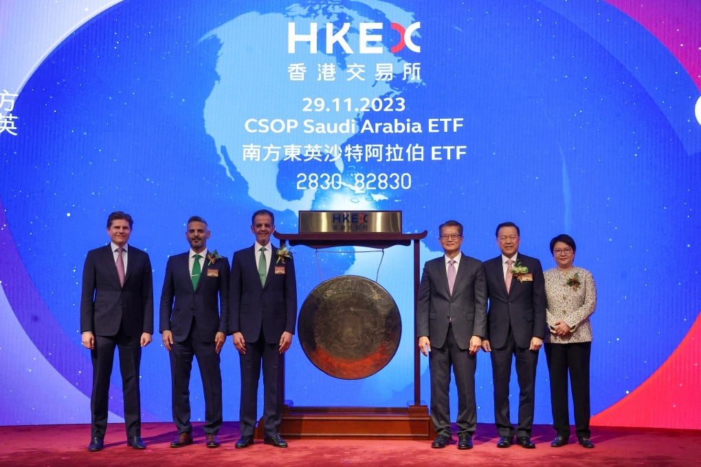 (From left) Nicolas Aguzin, CEO of HKEX; Abdulmajeed Alhagbani, head of securities investments at PIF; Yazeed Al-Humied, the deputy governor of PIF; Financial Secretary Paul Chan; SFC chairman Lui Tim Leung and CSOP CEO Ding Chen attend the listing ceremony of the CSOP Saudi Arabia ETF on Wednesday. Photo: Edmond So