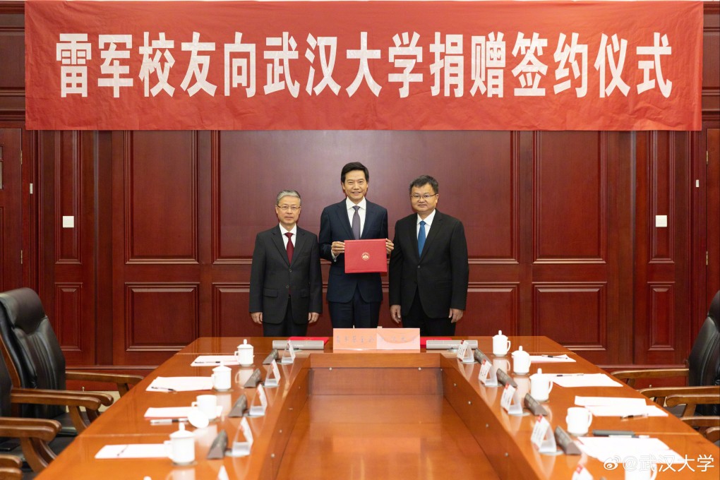 Xiaomi co-founder and chief executive Lei Jun, middle, has donated a record 1.3 billion yuan (US$183 million) to his alma mater Wuhan University. A signing ceremony was held at the university on its 130th anniversary on November 29, 2023. Photo: Wuhan University