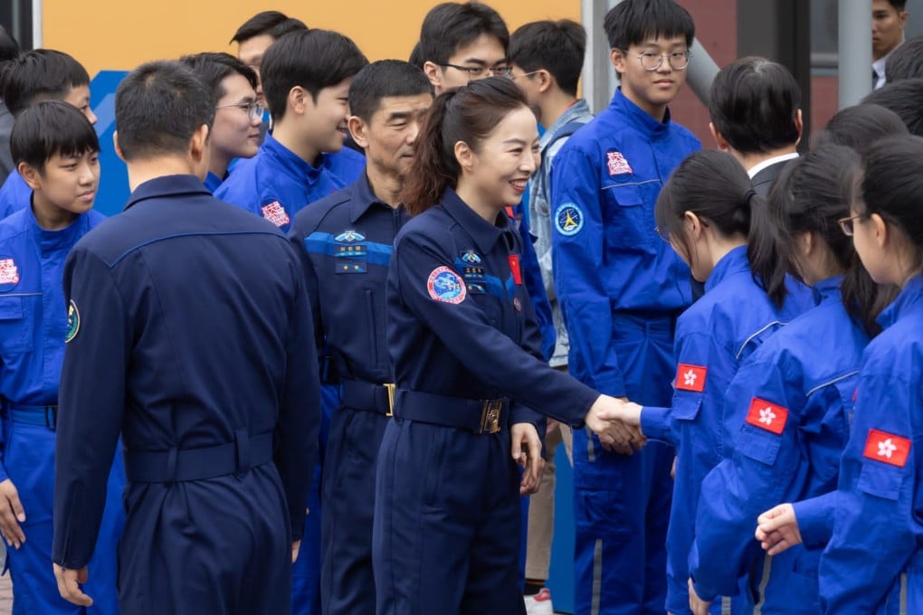 Chinese astronauts attend the opening ceremony for the museum exhibition. Photo: Handout