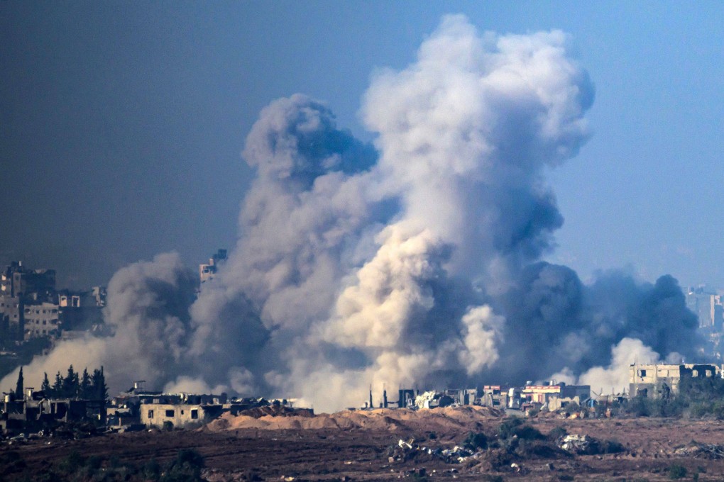 Smoke rises from buildings in southern Gaza after Israeli strikes on Friday. Photo: AFP