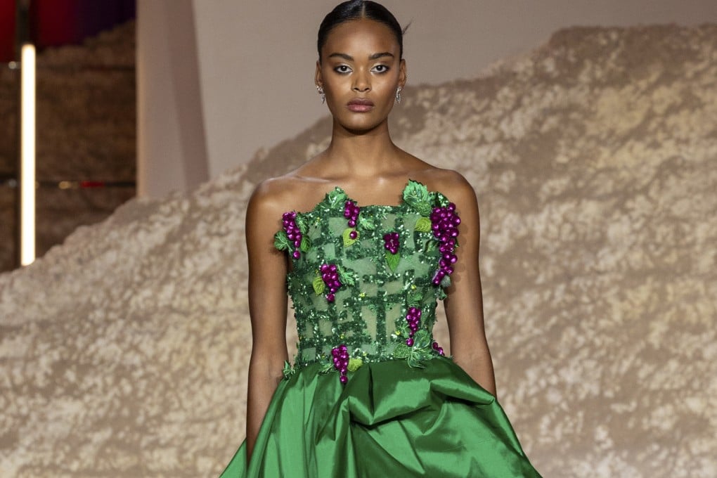 A look from the couture show of Saudi designer Adnan Akbar, who once dressed Princess Diana, shown at the first Riyadh Fashion Week in Saudi Arabia. A mixed-gender crowd watched a string of looks, mostly from home-based designers, come down the catwalk. Photo Getty Images