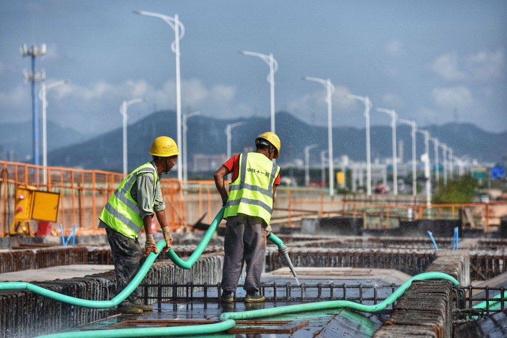 A crew works on the Hezhou-Gaolan Port Highway, set to link the west bank of the Pearl River estuary and the Guangdong-Hong Kong-Macao Greater Bay Area. A think tank has proposed deeper links between parts of the Greater Bay Area, similar to the European Union’s common market. Photo: Xinhua