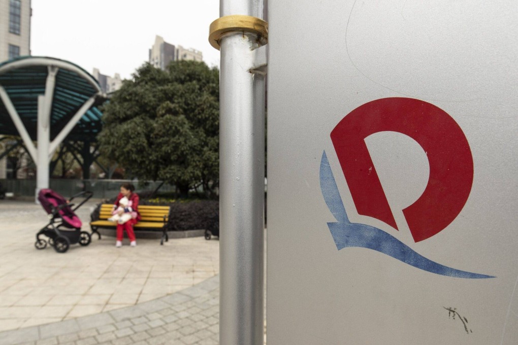 Signage for the China Evergrande Group at Evergrande Plaza, in Hefei, China. Photo: Bloomberg