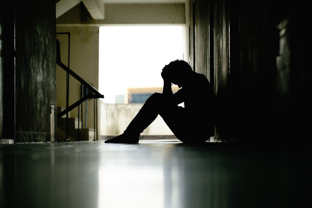 Silhouette of depressed man. Four of five men who reported assaults regretted doing so, saying that police were often unsympathetic and disinterested and that the process just added more trauma. Photo: Shutterstock