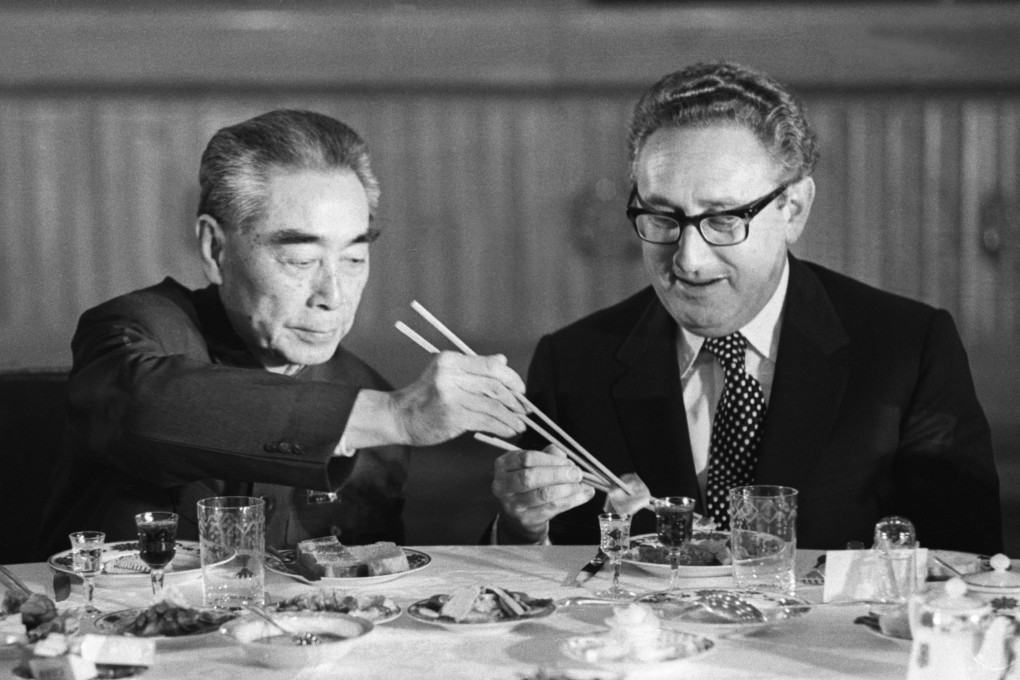 US secretary of state Henry Kissinger (right) accepts food from Chinese premier Zhou Enlai during a state banquet in the Great Hall of the People in Beijing in 1973. Photo: Bettmann