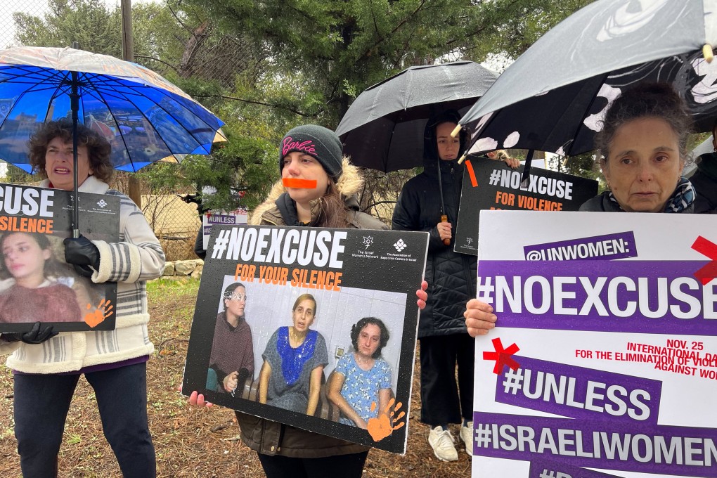 Demonstrators hold signs against what they describe as international silence over sexual violence perpetrated against Israeli women during the attack by Hamas on southern Israel on October 7, at a protest in Jerusalem on November 27. Photo: Reuters