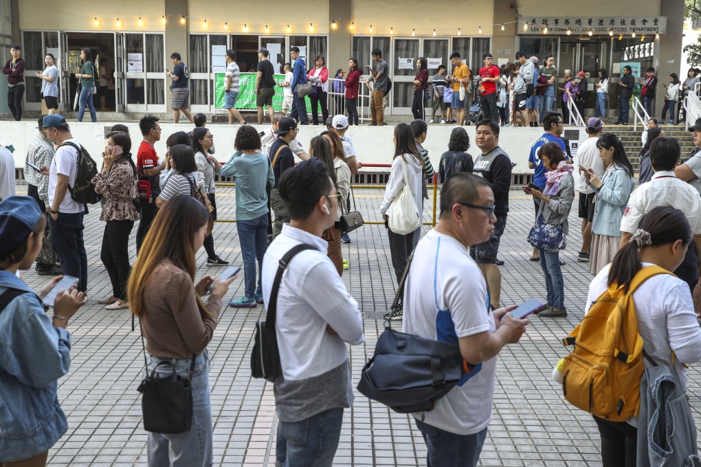People at a polling station in 2019. Ex-chief executive Leung Chun-ying says the voter base of radical protesters is still sizeable. Photo: Winson Wong