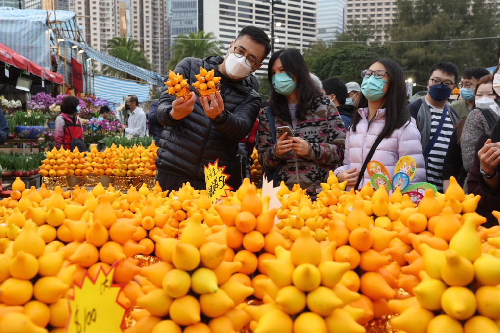 Shoppers browse a selection of fruit at a Lunar New Year fair, at Victoria Park in Causeway Bay, on January 20. Photo: Yik Yeung-man
