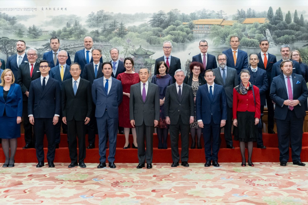 Chinese Foreign Minister Wang Yi meets with diplomatic envoys to China from the European Union and its member states in Beijing on December 4. Photo: Xinhua