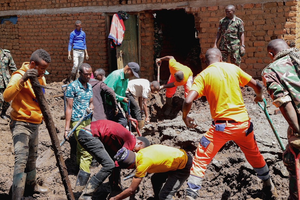 Members of the Tanzania Defence Forces and rescuers search for the bodies of people killed following flash floods and landslides near the slopes of Mount Hanang in the Manyara region, Tanzania on Monday. Photo: Reuters