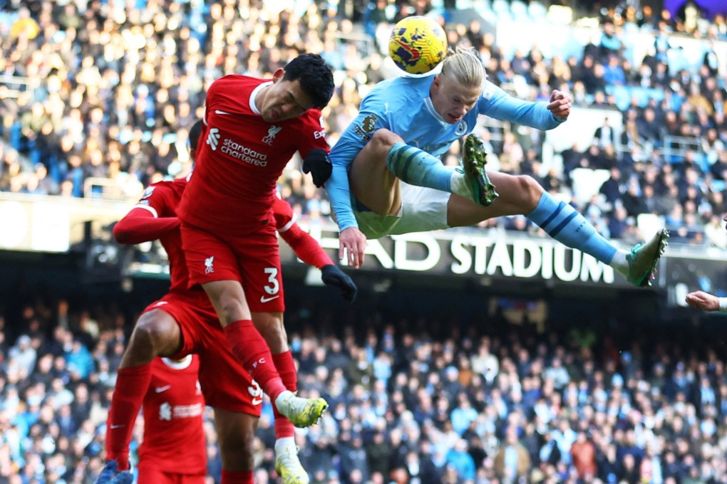 Manchester City’s Erling Haaland outjumps Liverpool’s Wataru Endo during their clubs’ Premier League clash last month. Photo: Reuters