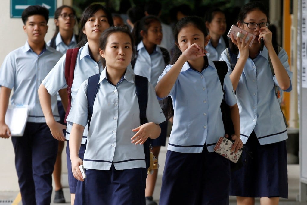 Signapore students got top marks in the latest world education assessment performed by the OECD. Photo: Reuters