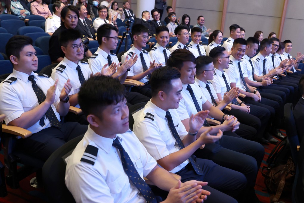 Nineteen men and two women have completed Cathay Pacific’s inaugural integrated programme after about 75 weeks of training. Photo: Yik Yeung-man