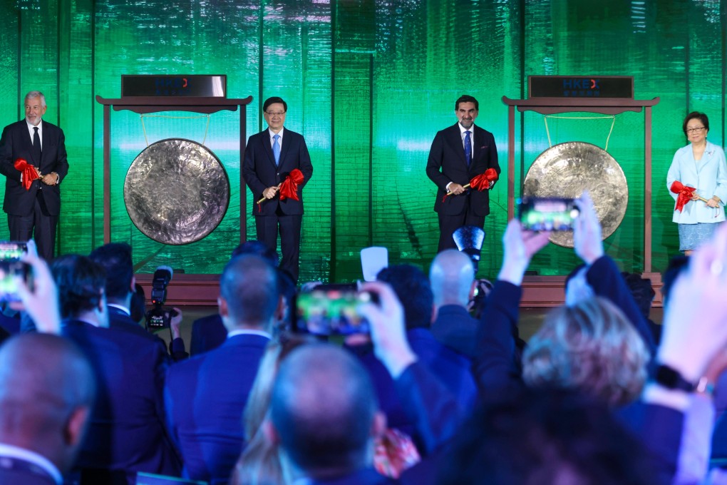 (From left) FII Institute CEO Richard Attias, Chief Executive John Lee, FII Institute chairman Yasir Al-Rumayyan, HKEX chairwoman Laura Cha at the gong-striking ceremony at the FII Priority Hong Kong conference on Thursday. Photo: Jonathan Wong