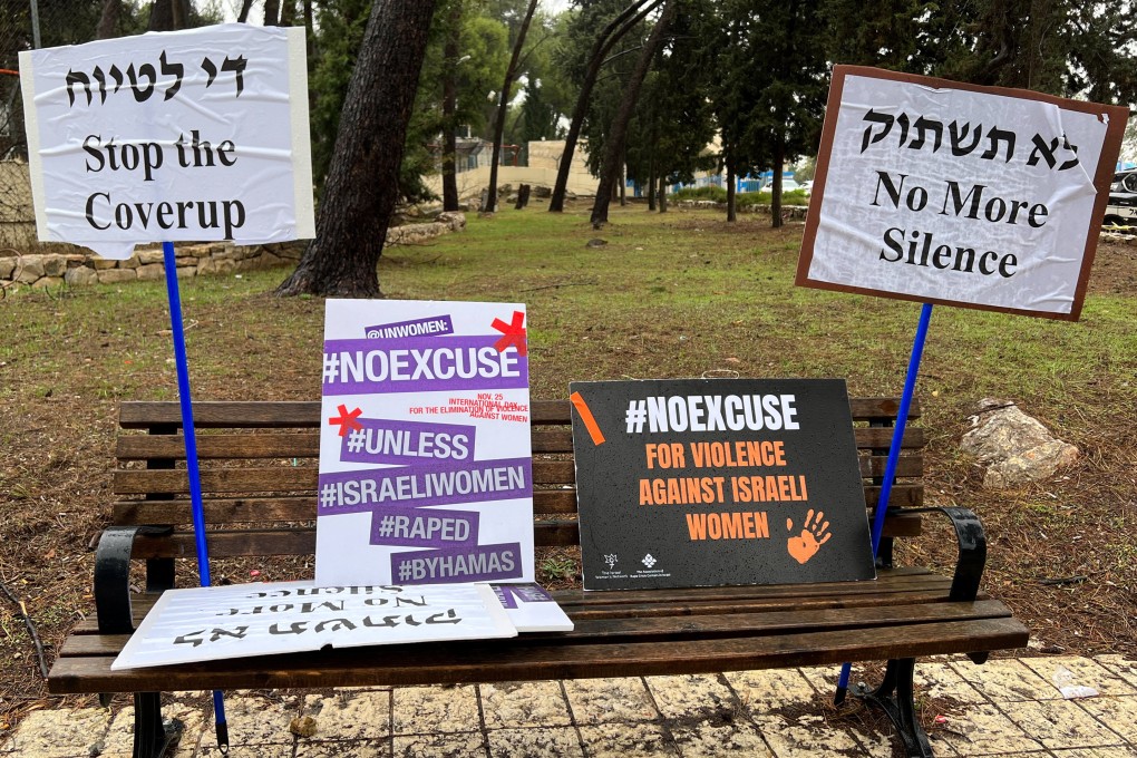 Signs against what protesters describe as silence over sexual violence perpetrated against Israeli women during the attack by Hamas on October 7. Photo: Reuters