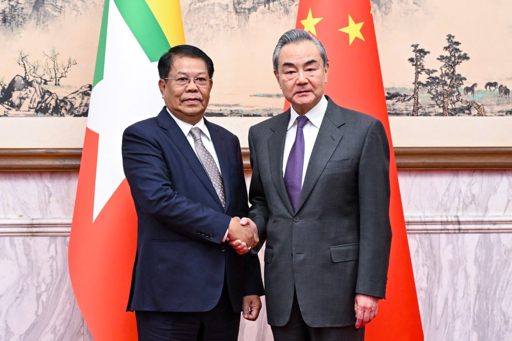 China’s top diplomat Wang Yi (right) meets Myanmar’s Deputy Prime Minister and Foreign Minister Than Swe in Beijing on Wednesday. Photo: Xinhua